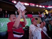 Lora Stoudt, 82, left, and Marge Gregg, 83, from VanMall Retirement, cheer on the Blazers at the Moda Center against the Spurs, Wednesday, February 19, 2014.