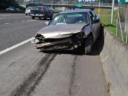 Two teenagers abandoned their car after crashing into a barrier on Interstate 5 northbound just north of Main Street.