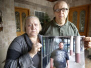 Afrodita and Cristian Asanachescu talk about their son, Marius Asanachescu, at their home March 22 in Vancouver. Marius died while in custody in the Clark County Jail on Feb.