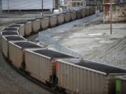 A coal train heads north through Bellingham in 2011.