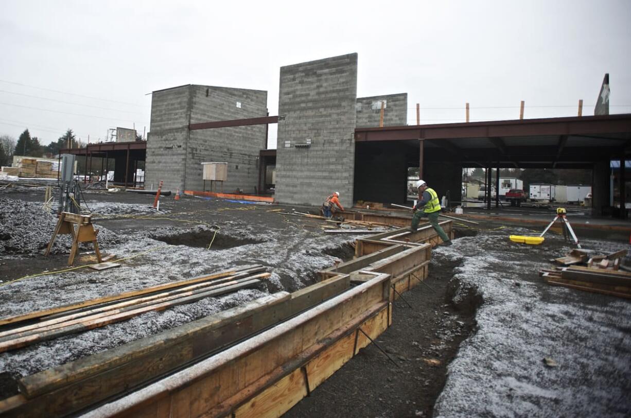 Construction crews are at work building a new Crestline Elementary School. The original building was destroyed by fire Feb. 3.