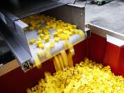 Completed Lego bricks come off the production line in Denmark.