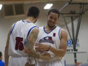 Chehales Tapscott, right, in his final home game for the Vancouver Volcanoes