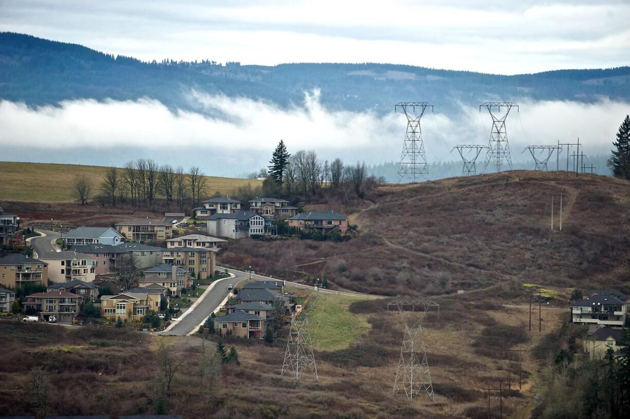 Existing power lines through Washougal, photographed from a helicopter in January 2013, are along part of the proposed route for a new Bonneville Power Administration transmission line that would run from Castle Rock to Troutdale, Ore.