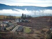 Existing power lines through Washougal, photographed from a helicopter in January 2013, are along part of the proposed route for a new Bonneville Power Administration transmission line that would run from Castle Rock to Troutdale, Ore.