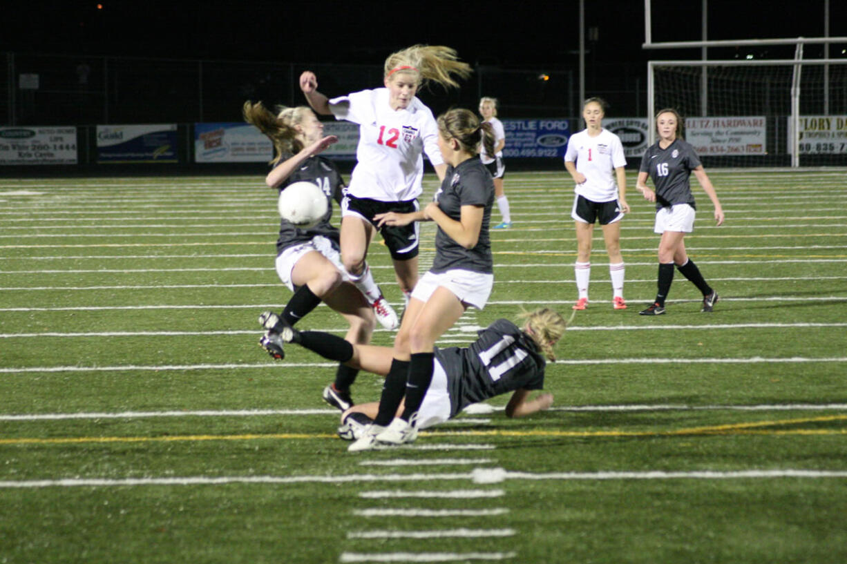 Riley Allison bursts through three Union Titans Saturday, at Doc Harris Stadium.