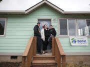 Nikki Danforth and her sons Coby, left, and Koda pose Sunday at their new home in the Lincoln neighborhood.