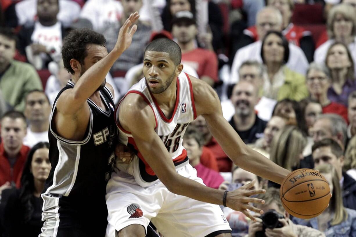 Nicolas Batum, right, said he wants to have an impact on different phases of the game and is getting that chance this year with the Blazers' improved roster.