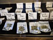 A selection of marijuana is displayed for customers at Main Street Marijuana in Vancouver. Sales are down since legalization in Oregon, but entrepreneurs say business is still robust.