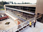 Awning-style photovoltaic arrays that not only produce solar energy but also provide shade to cut down on cooling costs on sunny days are shown at Henrietta Lacks Health and Bioscience High School in Vancouver.