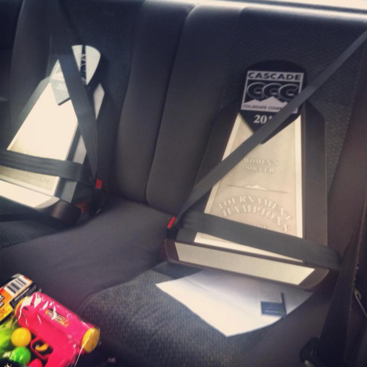 The Cascade Collegiate Conference regular season and tournament championship trophies safely belted in the back seat of Concordia University senior midfielder Hannah Kimsey's car.