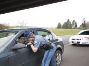 Washington State Trooper, Alexis Tonissen, talks to an aggressive speeder she pulled over along the side of I-5 North in Cowlitz County in March.