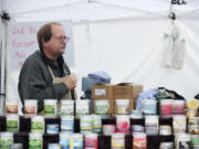 Steven Lane/Columbian files
Steve Wildman, from Candeo Candles, works at the Vancouver Farmers Market in 2012.