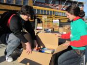 Post-Record file photo
Students at Camas and Washougal high schools will work toward a common goal of collecting 85,000 pounds of food during the sixth annual Stuff the Bus food drive. Donations can be dropped off at either high school from noon to 5 p.m. Friday, Dec. 6.