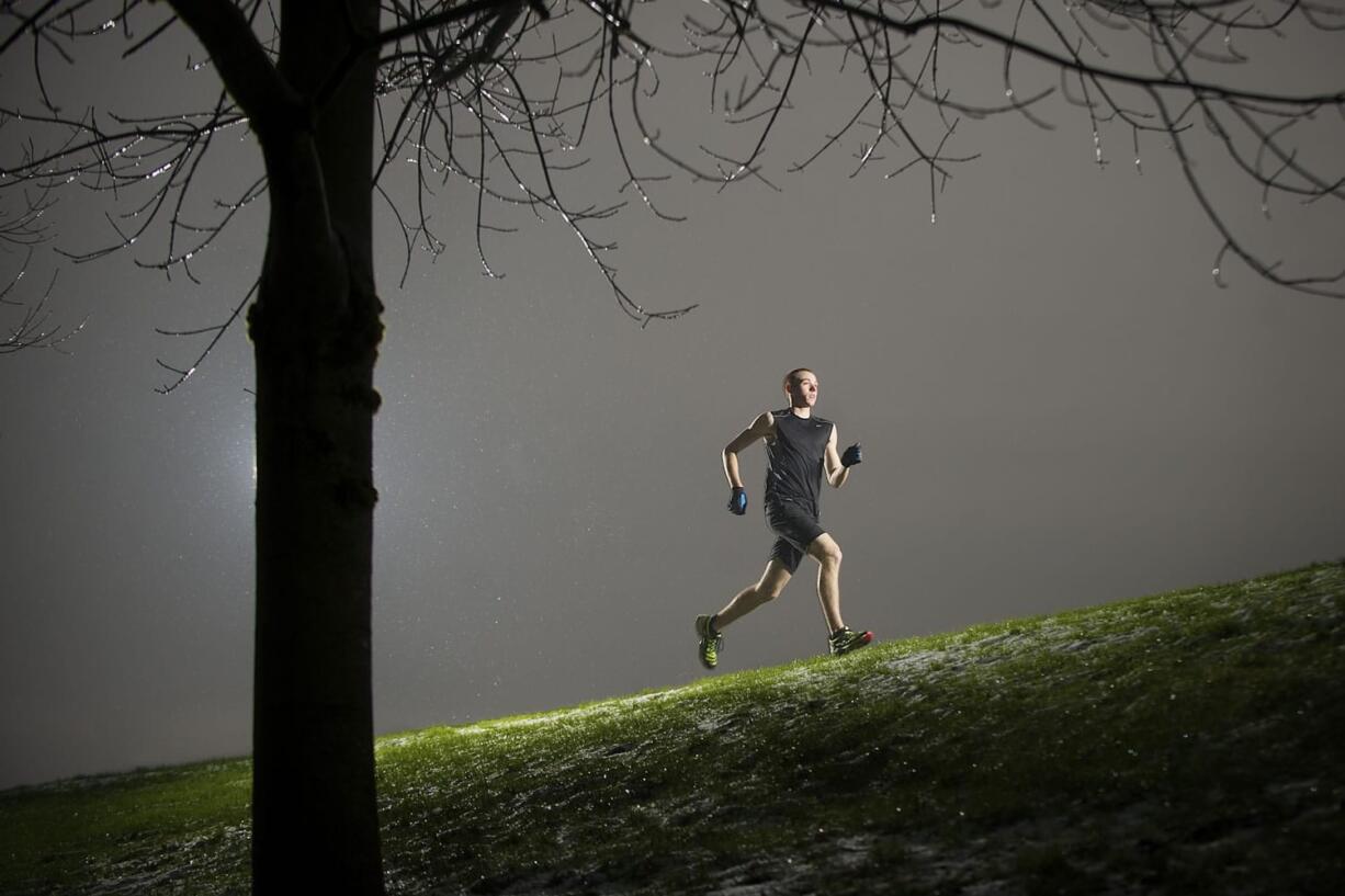 Austin Blankenship of Columbia River High School runs near Bliss Road last week in Vancouver.