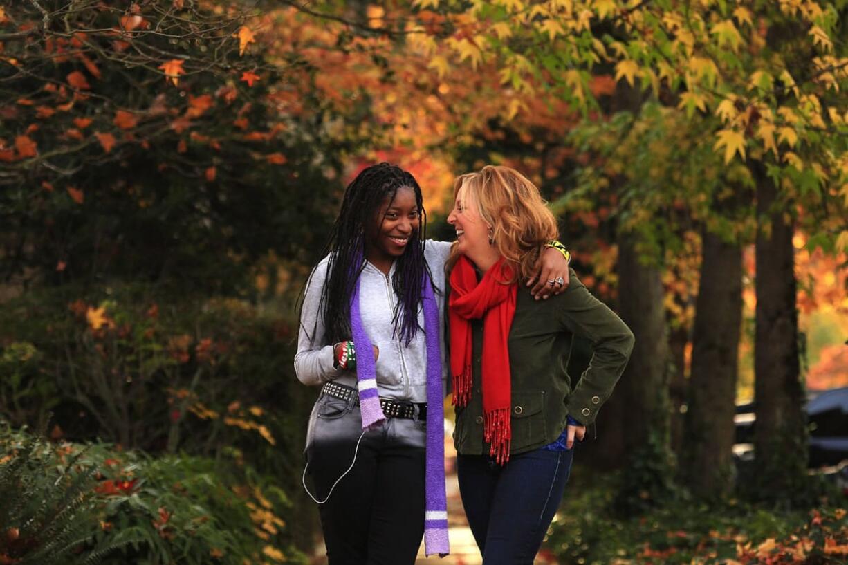 Marvina Davis, left, has matured with the help of her Big Sister, Dana Smith, who has been like &quot;a second mom&quot; for nearly 12 years, with help from Big Brothers Big Sisters of Puget Sound.