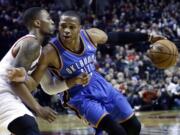 Oklahoma City Thunder guard Russell Westbrook, right, drives on Portland Trail Blazers guard Damian Lillard during the first half of a game on Dec.