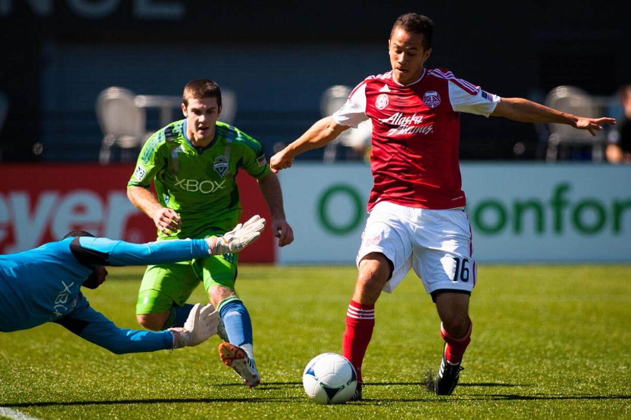 Brent Richards, right, in action against the Seattle Sounders reserves in 2012.