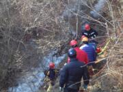 Rescuers helped two men who slipped on ice and fell off the Cape Horn trail, east of Washougal.