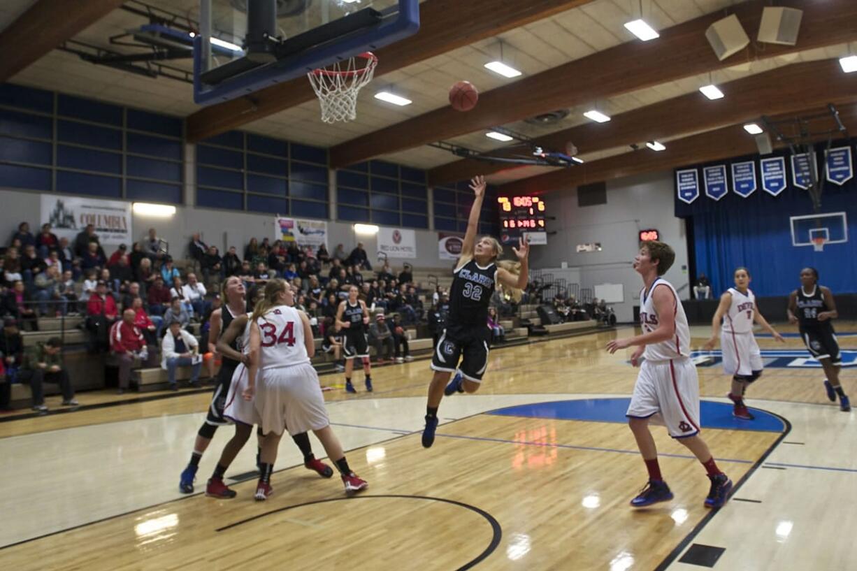 Clark's Nicolette Bond puts up a shot against Lower Columbia during the first half at Clark on Wednesday.