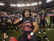 Jason Vailea leads the Camas football team through a pre-game Haka to get fired up to play Bellarmine Prep at the Tacoma Dome (Steven Lane/The Columbian)