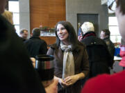 Alishia Topper greets supporters before a swearing-in ceremony at Vancouver City Hall on Tuesday  in Vancouver.