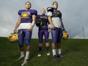 Jonathan Branson, left, Gabe Evenson, center, and Jayson Branson, right, photographed Thursday November 14, 2013 in Vancouver, Washington, are a big part of Columbia River's post football season playoff success.