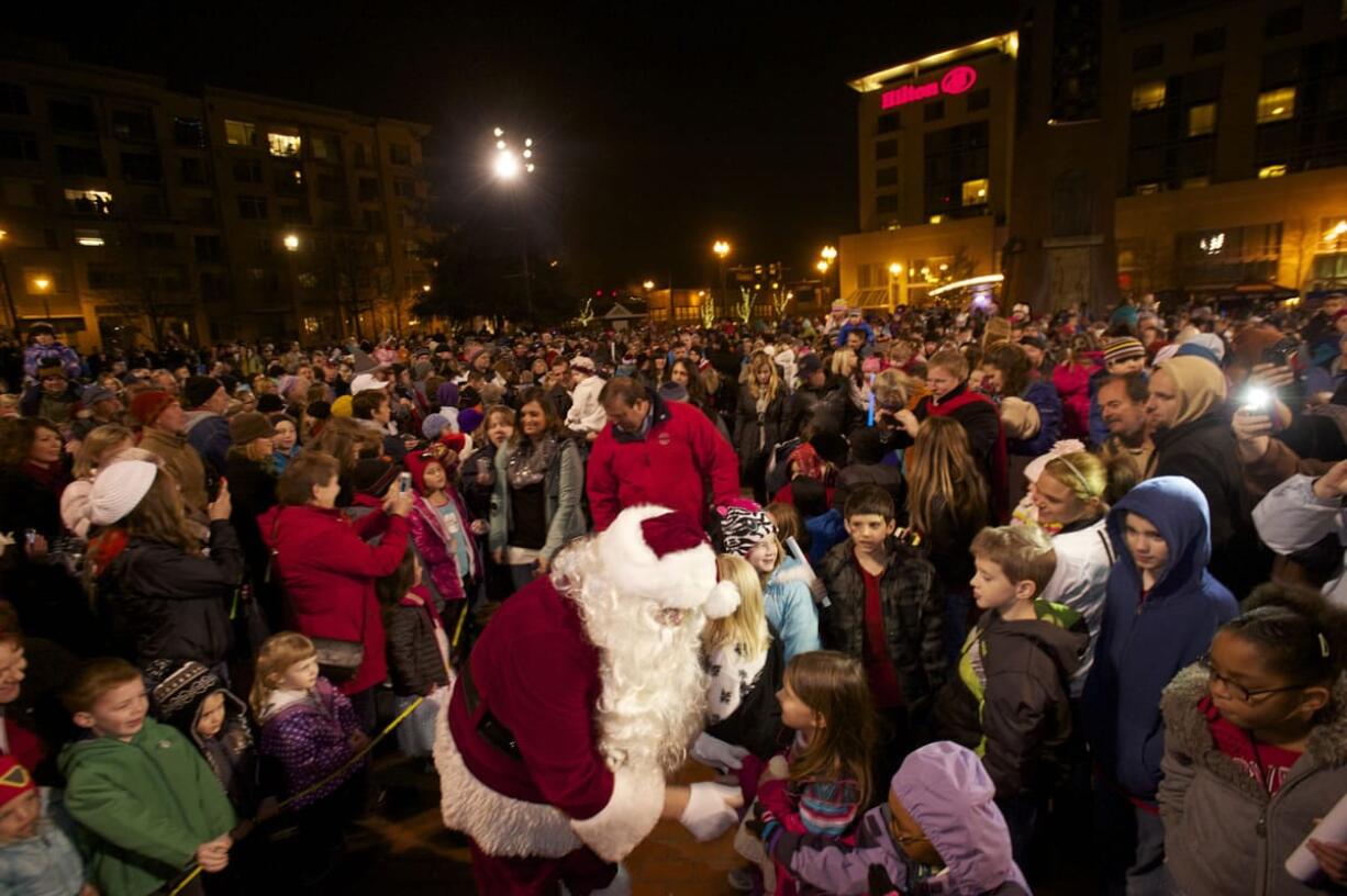 Santa arrives at Propstra Square on Friday during the annual tree lighting ceremony in Esther Short Park.