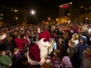 Santa arrives at Propstra Square on Friday during the annual tree lighting ceremony in Esther Short Park.