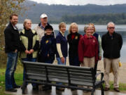 Washougal: Clark County Rotary Clubs members stand near a new bench at Captain William Clark Park, which was purchased with donated money this fall along with other improvements.