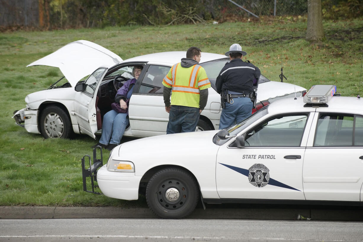 Washington State Patrol troopers investigate a traffic accident on the southbound offramp from I-5 to Mill Plain Boulevard on Tuesday.