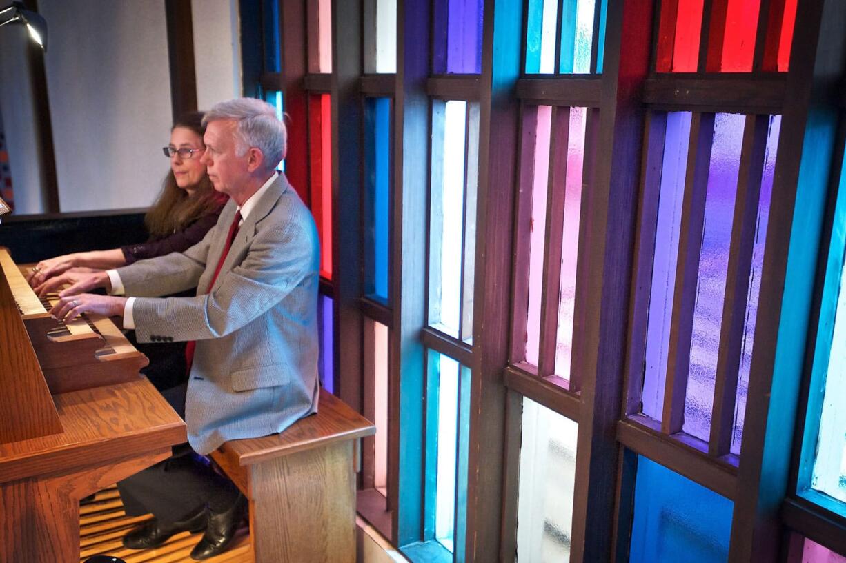 Husband and wife organists Timothy Nickel and Nancy LeRoi Nickel play a concert on Memorial Lutheran Church's pipe organ to help celebrate the church's 70th anniversary on Sunday.