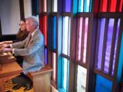 Husband and wife organists Timothy Nickel and Nancy LeRoi Nickel play a concert on Memorial Lutheran Church's pipe organ to help celebrate the church's 70th anniversary on Sunday.