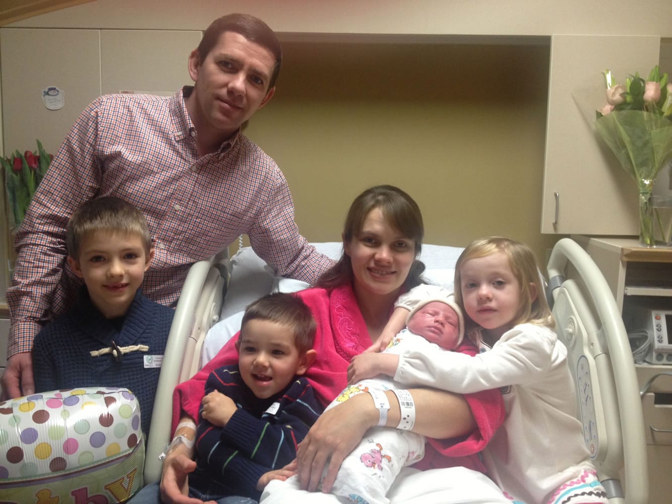 A Vancouver family welcomes the first baby born in a Clark County hospital in 2014. Here are Vasiliy Stanislavov and wife Liliya, and children Mark, 7, Andre, 2, Victoria, 4, and baby Ella, who arrived at 1:07 a.m.