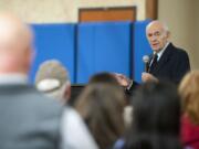 Alter Wiener tells a Battle Ground audience Thursday night about his experiences as a Holocaust survivor. He has written about his life in &quot;From a Name to a Number,&quot; which refers to the identity number he was issued by the Germans: 64735.