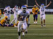 Mountain View's Nicholas Wright (7) runs in a touchdown against Columbia River on Friday. It was one of four TDs for Wright in the 34-28 win.