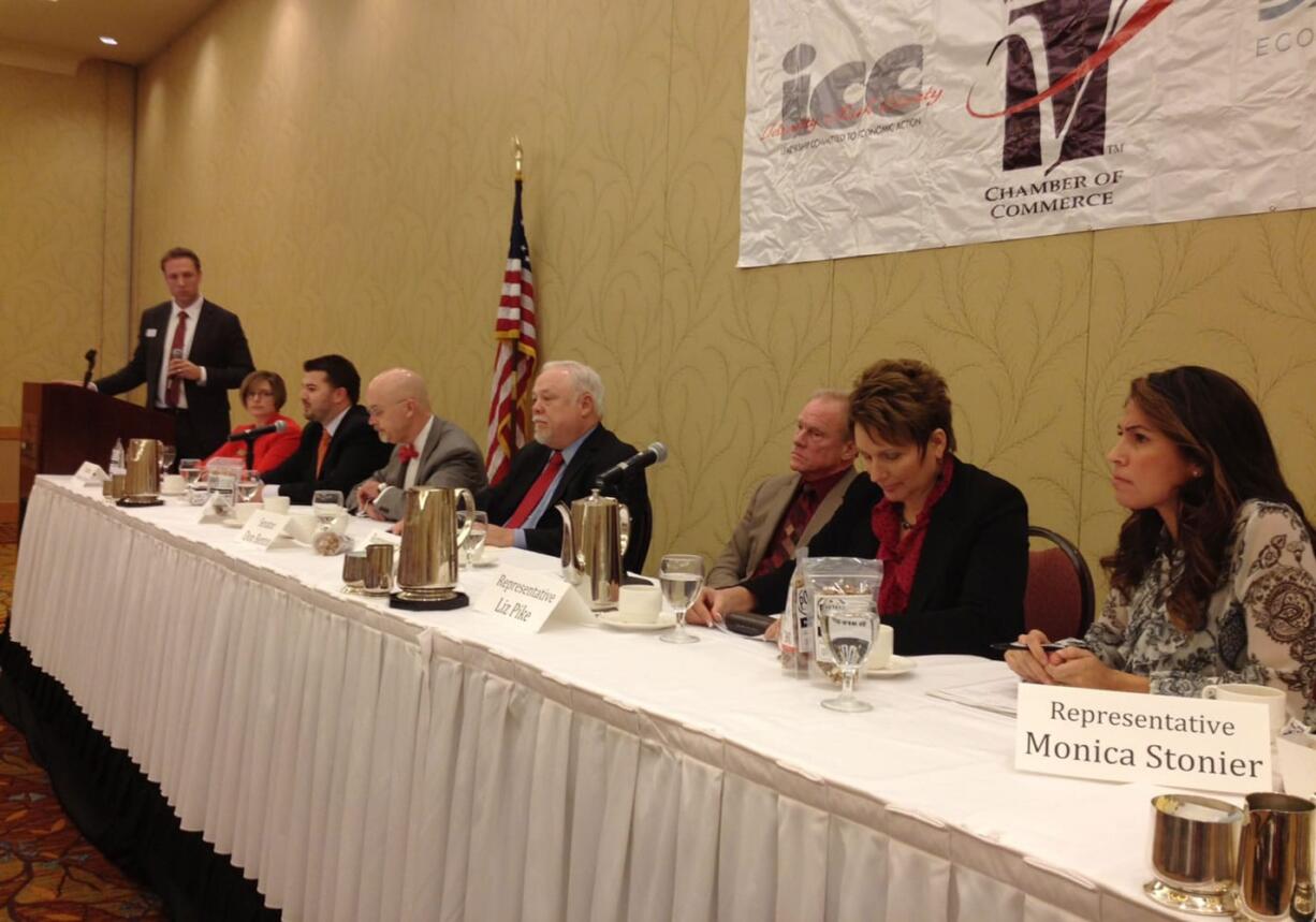 From left, Columbia River Economic Development Council President Mike Bomar and state legislators Sen. Annette Cleveland, D-Vancouver; Rep. Brandon Vick, R-Vancouver; Rep. Jim Moeller, D-Vancouver; Sen. Don Benton, R-Vancouver; Rep. Paul Harris, R-Vancouver; Rep. Liz Pike, R-Camas; and Rep. Monica Stonier, D-Vancouver, attend a legislative outlook breakfast at the Hilton Vancouver Washington on Wednesday.