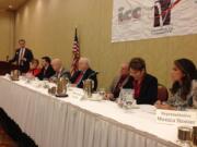 From left, Columbia River Economic Development Council President Mike Bomar and state legislators Sen. Annette Cleveland, D-Vancouver; Rep. Brandon Vick, R-Vancouver; Rep. Jim Moeller, D-Vancouver; Sen. Don Benton, R-Vancouver; Rep. Paul Harris, R-Vancouver; Rep. Liz Pike, R-Camas; and Rep. Monica Stonier, D-Vancouver, attend a legislative outlook breakfast at the Hilton Vancouver Washington on Wednesday.