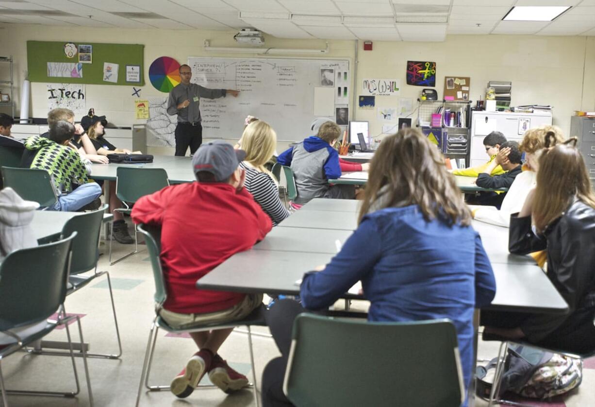 iTech Preparatory Middle School students learn Thursday about the many considerations in designing a school from Casey Wyckoff of LSW Architects.