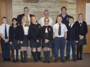 Camas: Camas Mayor Scott Higgins, from left, Washougal Mayor Sean Guard and Vancouver Mayor Tim Leavitt stand with student leaders from Pacific Crest Academy during a Nov. 22 visit.