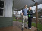 Josh and Rachel Wasser have had security issues since the county widened the street in front of their home on Northeast 119th Street.