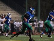 Mountain View's Nicholas Wright runs for a touchdown during a Class 3A playoff game against Mountlake Terrace.