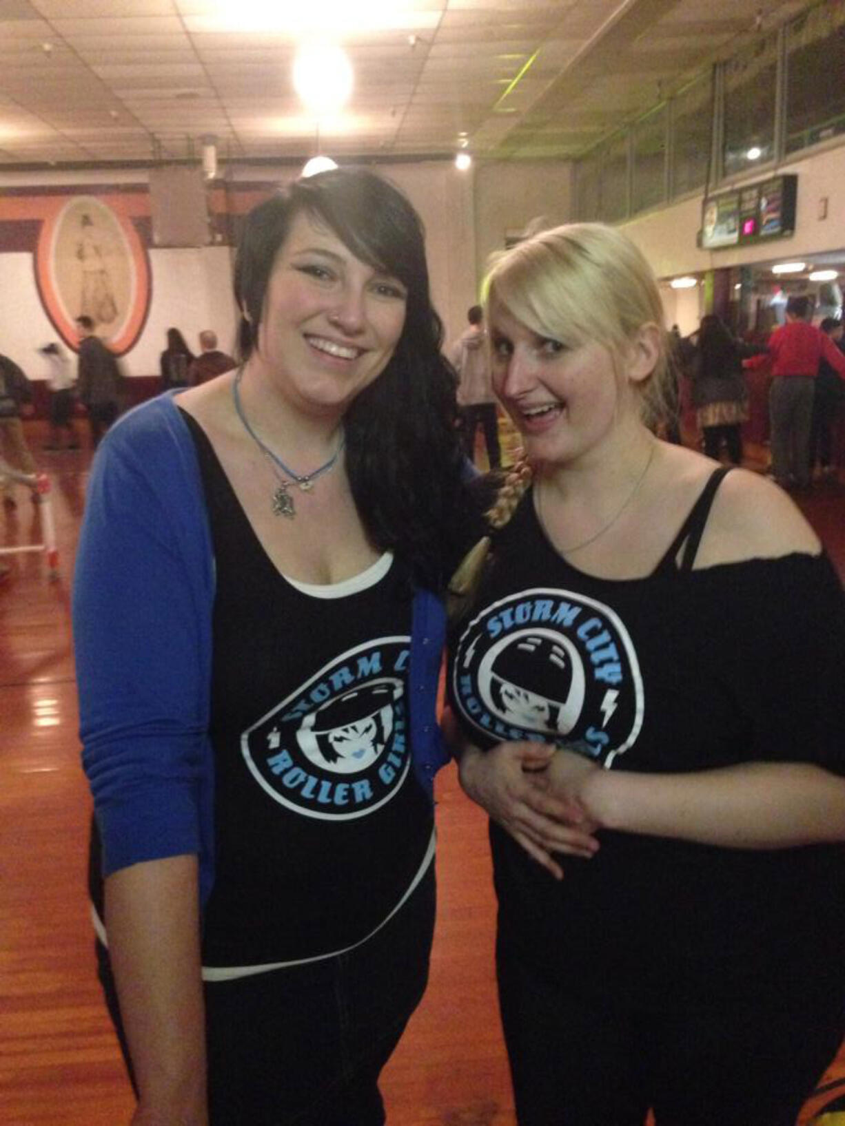 Meadow Homes: Jamie &quot;JabHer Jaw&quot; Smith, left, and Alyson &quot;Double Dee&quot; McCoy, members of the Storm City Roller Girls team, participate in a Feb.