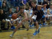 Hockinson's Jack Klodt drives against Mark Morris' Cameron Mosier during the second half Thursday.