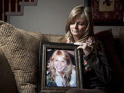 Denise Ellis holds a photograph of her 18-year-old daughter Mandy Lathim at her home in east Vancouver. Mandy, a Mountain View High School grad, died in a car crash during a road trip to California in July 2012. Denise went to great lengths to honor her daughter's wish to have her organs donated and Denise has reached out to the people who received Mandy's organs.