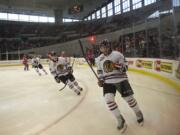 The Winterhawks' Chase De Leo pumps his fist after scoring against the Chiefs making it 2-0 in the second period at the Daylight Classic game at Memorial Coliseum on Sunday.