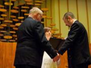 Portlanders and committed United Church of Christ members Jim McPartland, left, and Grant Edwards were wed on Nov. 9 at the First Congregational United Church of Christ in Hazel Dell. The Rev.