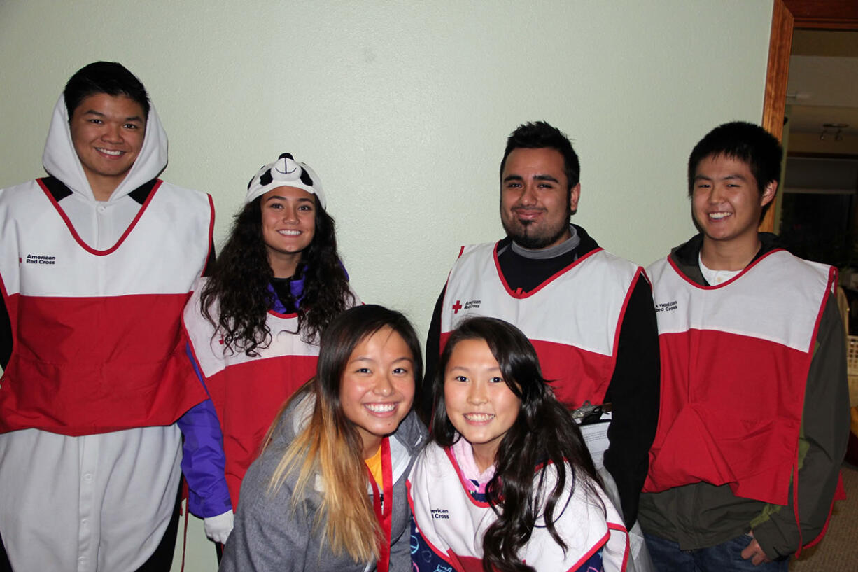 Clark County: Mountain View High School students Erik Nguyen, back row from left, Anneka Tolman, Mario Lopez and Michael Suk with Holland Vuu, front row from left, and Eunie Lim were a few local students who collected donations for the Red Cross while out on Halloween.