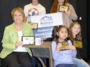 Ridgefield: Ridgefield School District Employee of the Month Nancy Anderson, clockwise from left, shows her award, with Students of the Month Alexander Ashmore, Jenna Mayer, Olivia Fenton and Naomy Martinez.