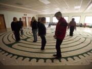 Some Clark County residents began 2014 with a New Year's Day labyrinth walk Wednesday at Vancouver's First Presbyterian Church.